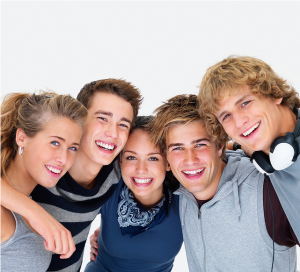 group of teens smiling - Invisalign teen